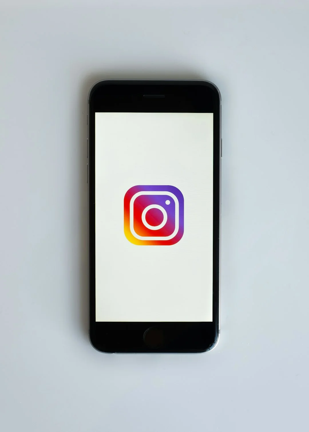 A smartphone screen displaying popular social media applications like Instagram and Twitter.